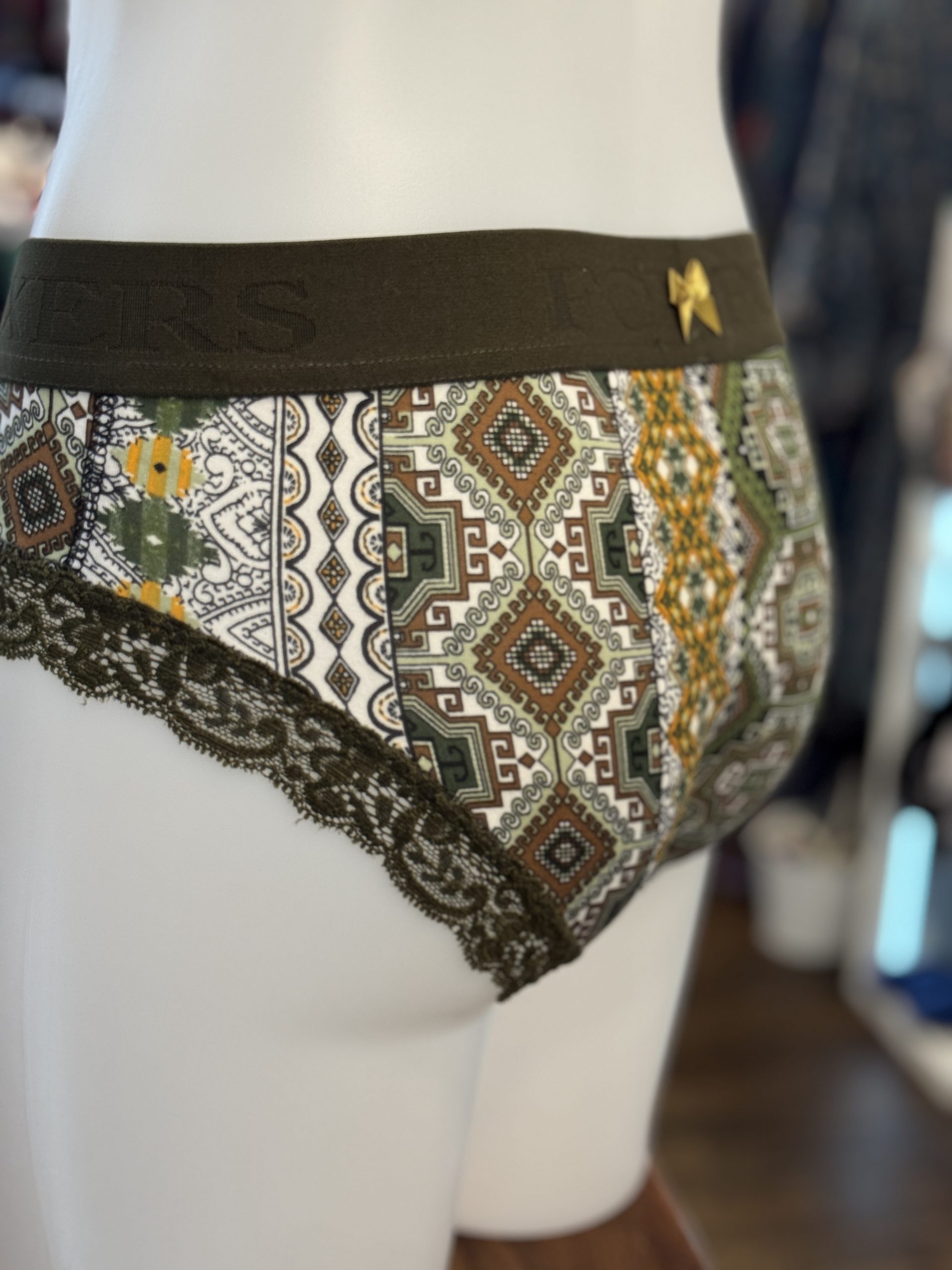 Olive Logoband over Golden Sage – Bild 3